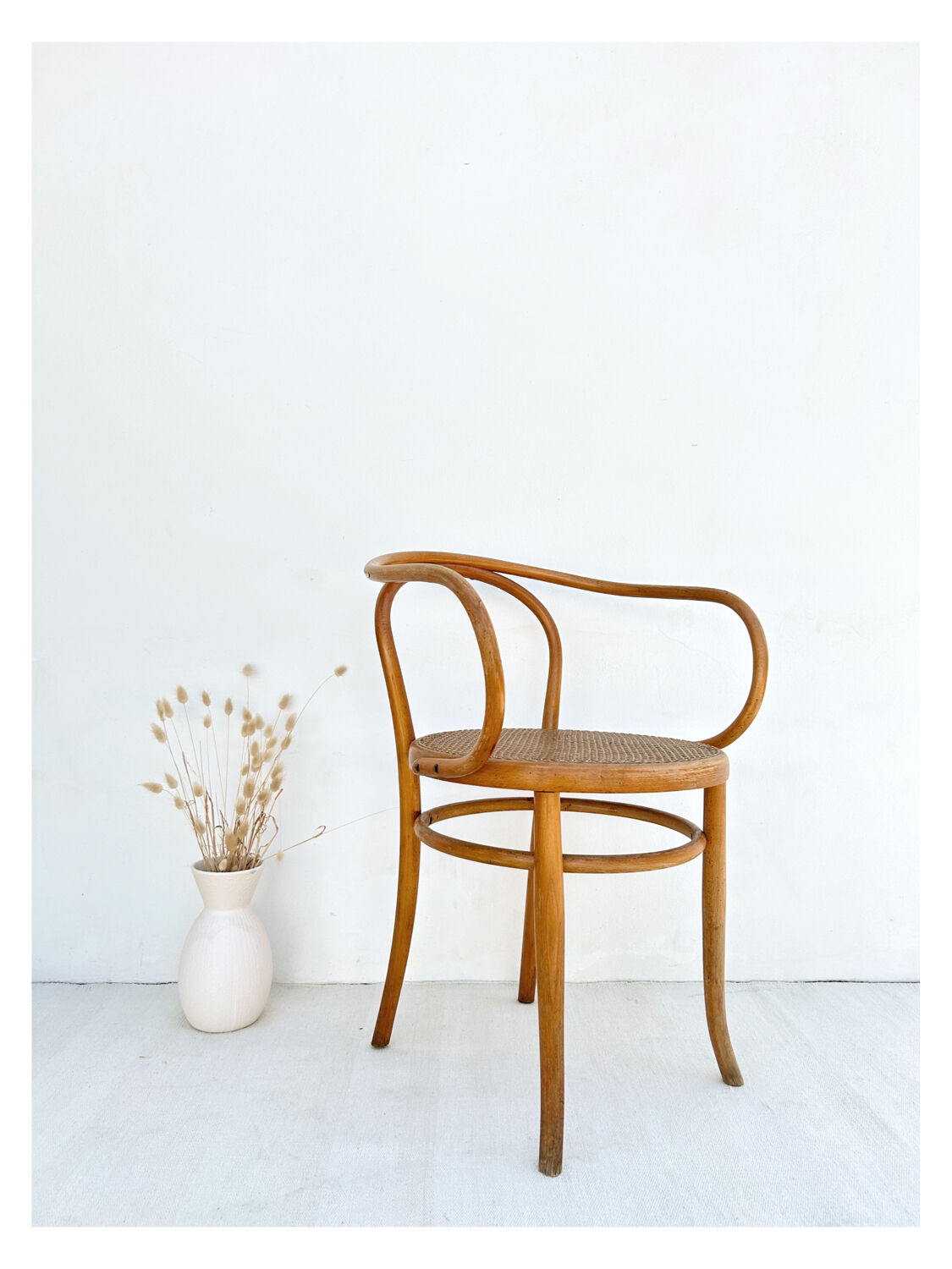 Fischel curved wood armchair