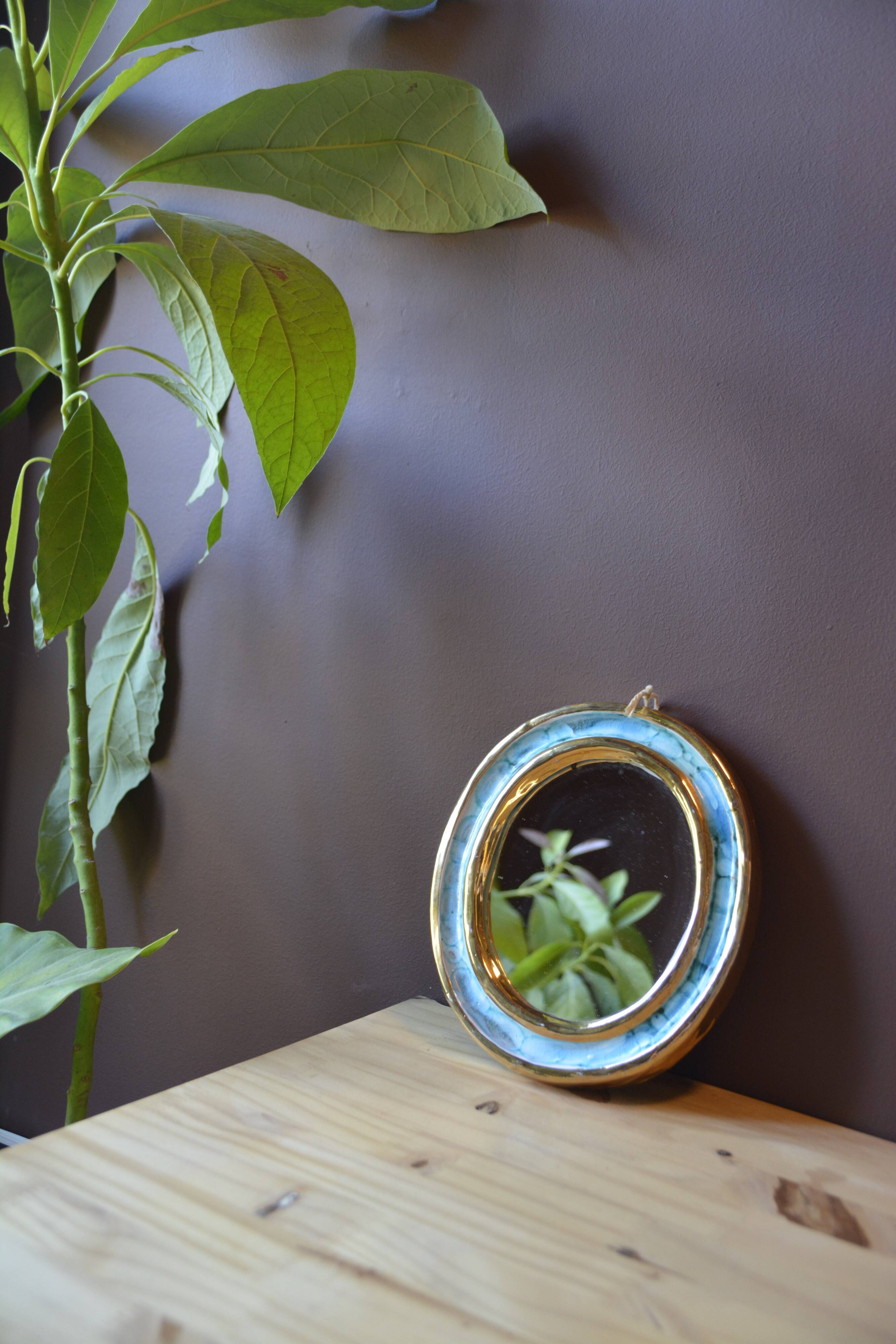 Blue and gold ceramic mirror
