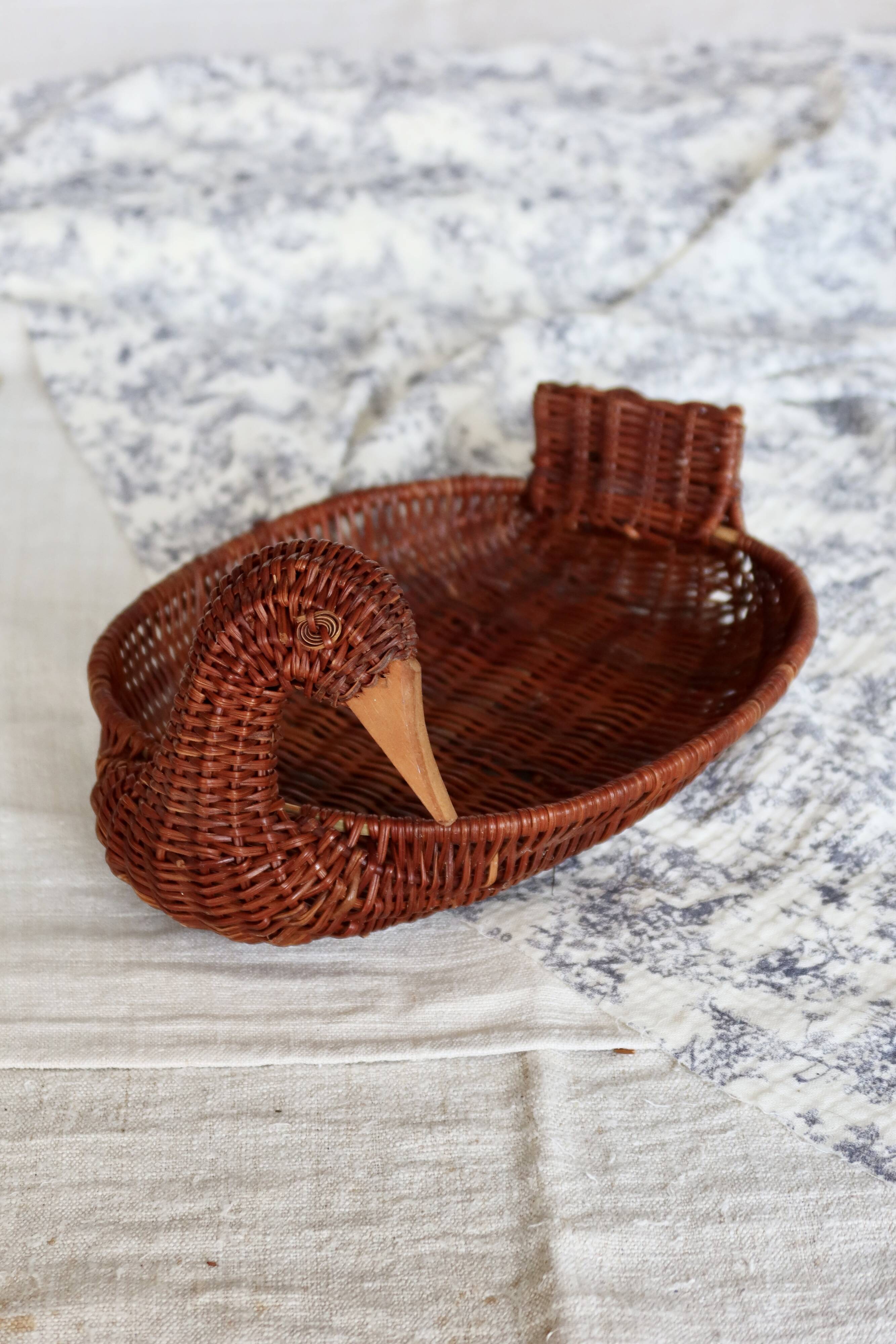 Vintage dark wicker duck basket