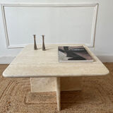 Square coffee table in travertine.