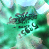 Art Deco oyster dish in green slip signed Sarreguemines DV, 12 oysters