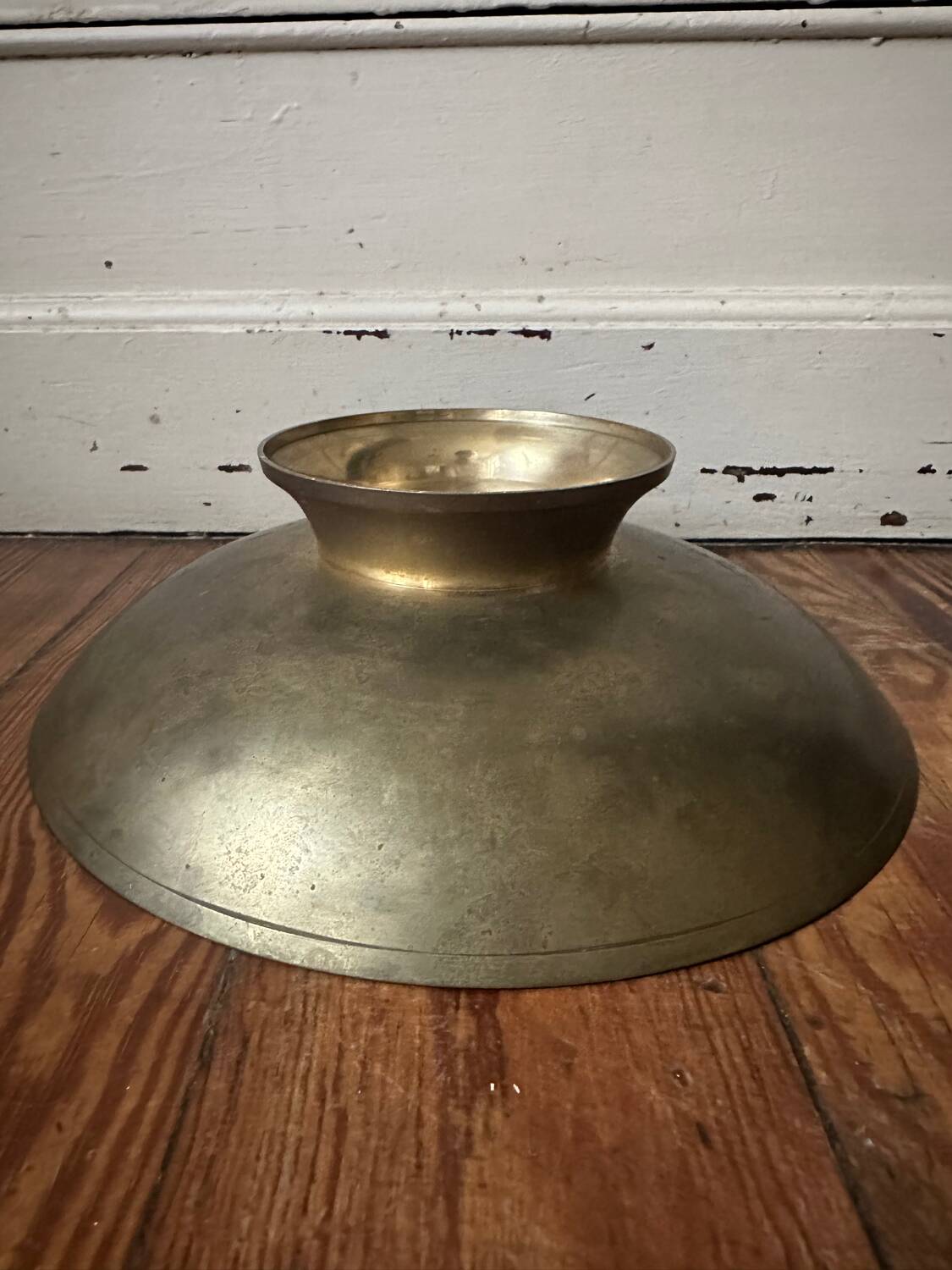 Enameled brass pocket emptier