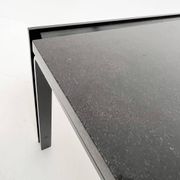 Black granite side table or coffee table from the 1980’s