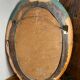 Oval mirror in carved wood