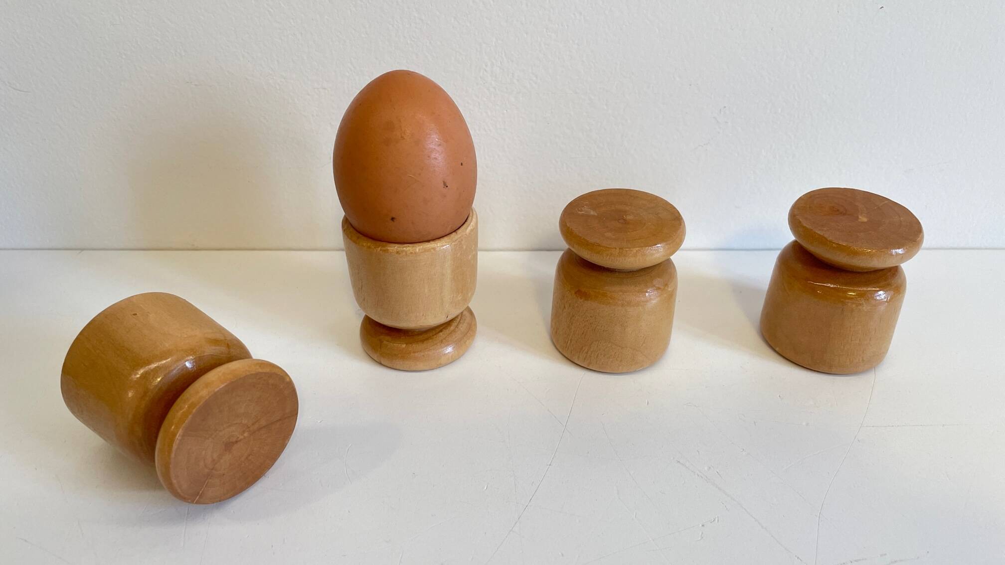 4 vintage turned wooden egg cups