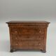 Commode de style Empire en placage de bois flammé