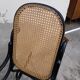 Rocking-chair noir canné bois courbé 1930