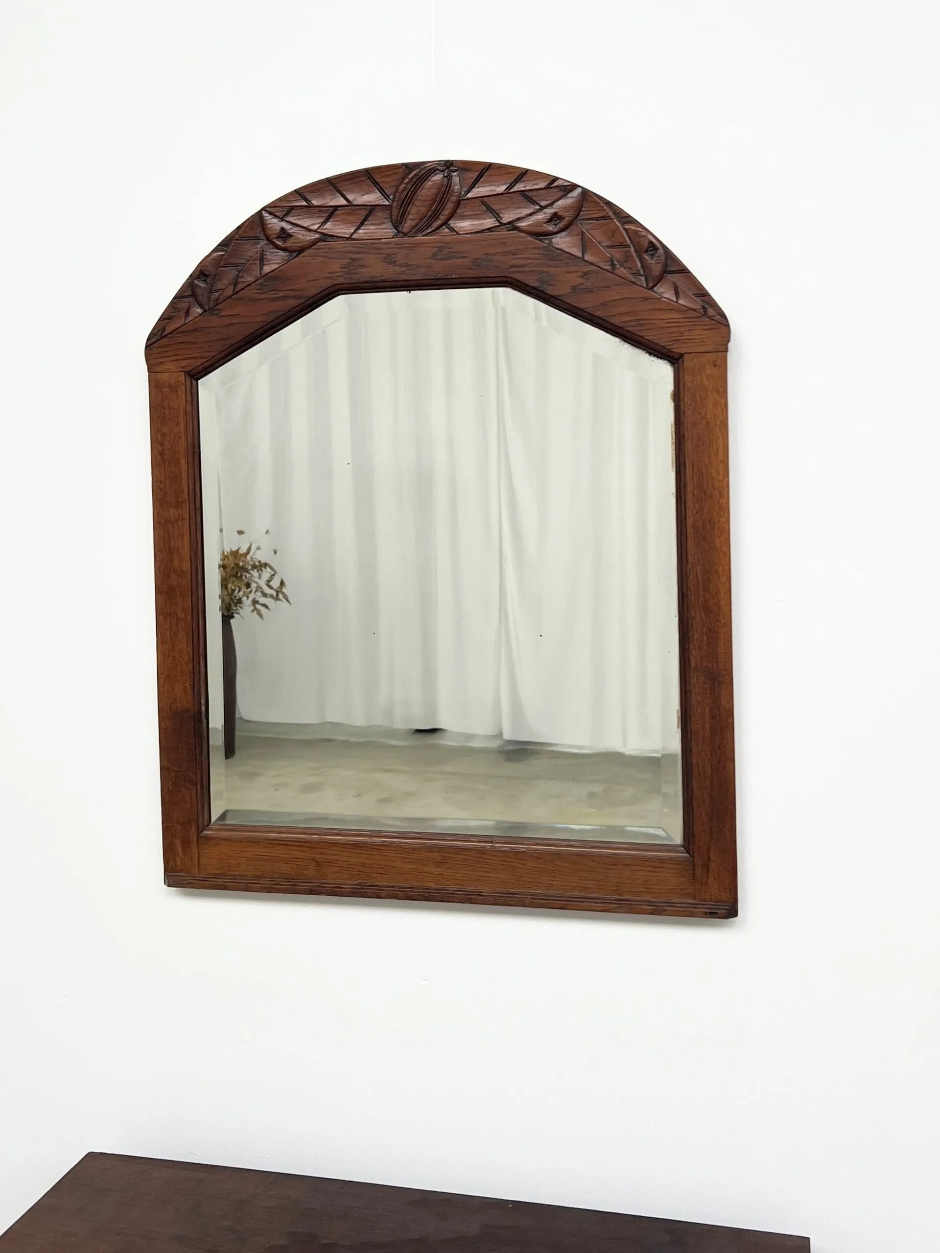Art Deco oak mirror with carved motif