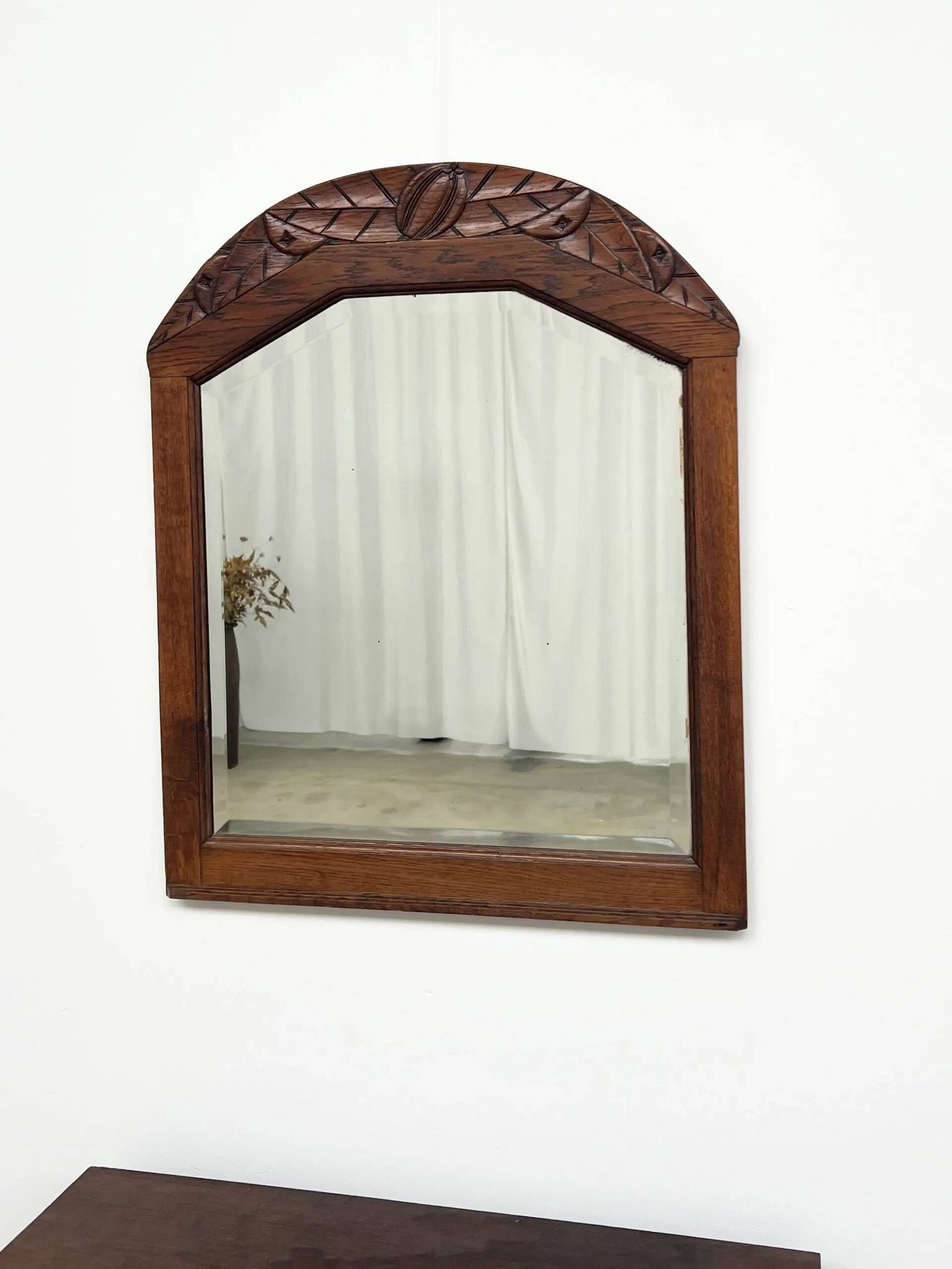 Art Deco oak mirror with carved motif
