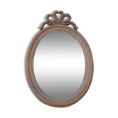 Oval mirror wood knot