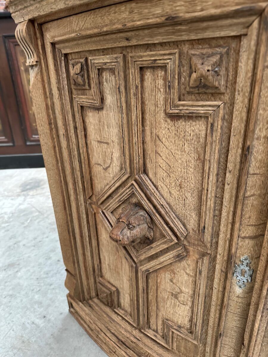 Corner cabinet in oak, late 19th century.