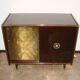 A vintage cabinet with a record player and a bar, 1960s.