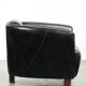 Black vintage cowhide aviator design armchair with characterful appearance