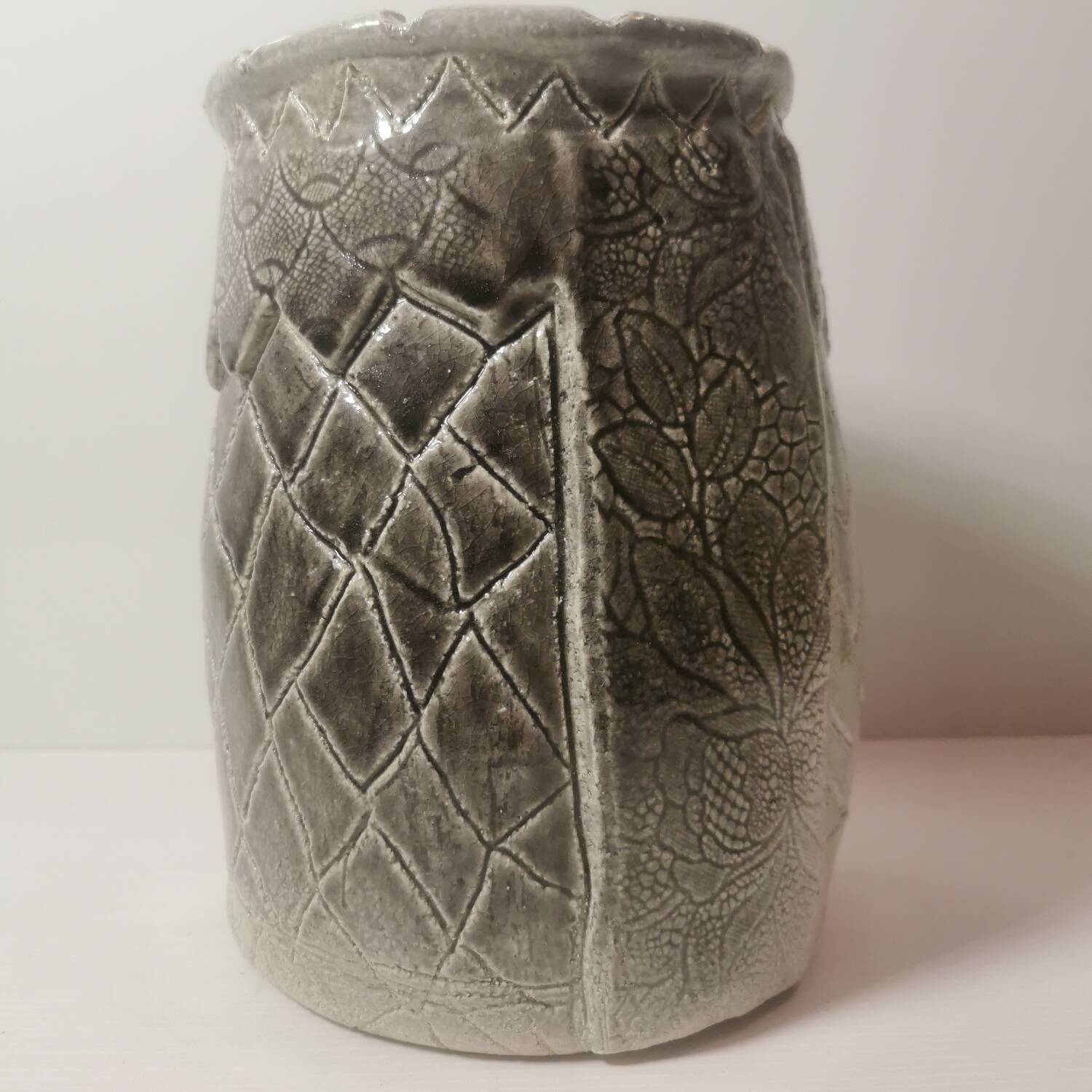 Ceramic vase or pot in gray beige color