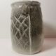 Ceramic vase or pot in gray beige color