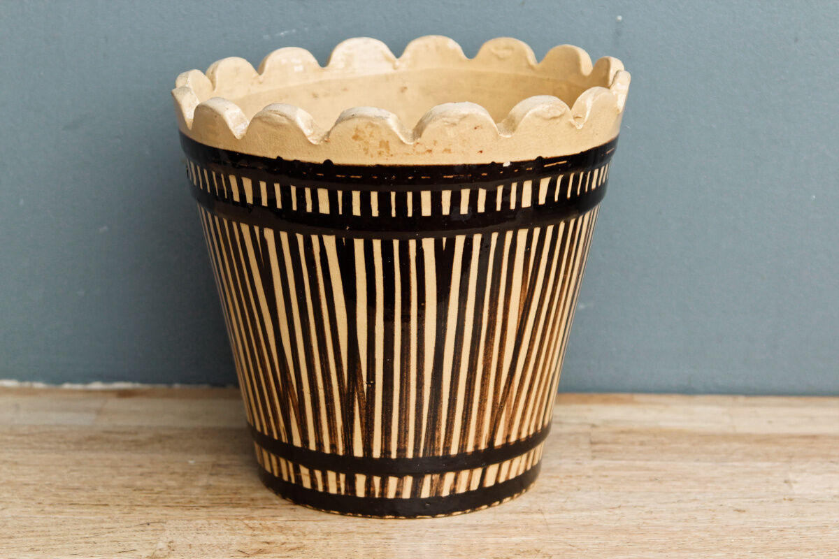 Vintage varnished sandstone pot cover