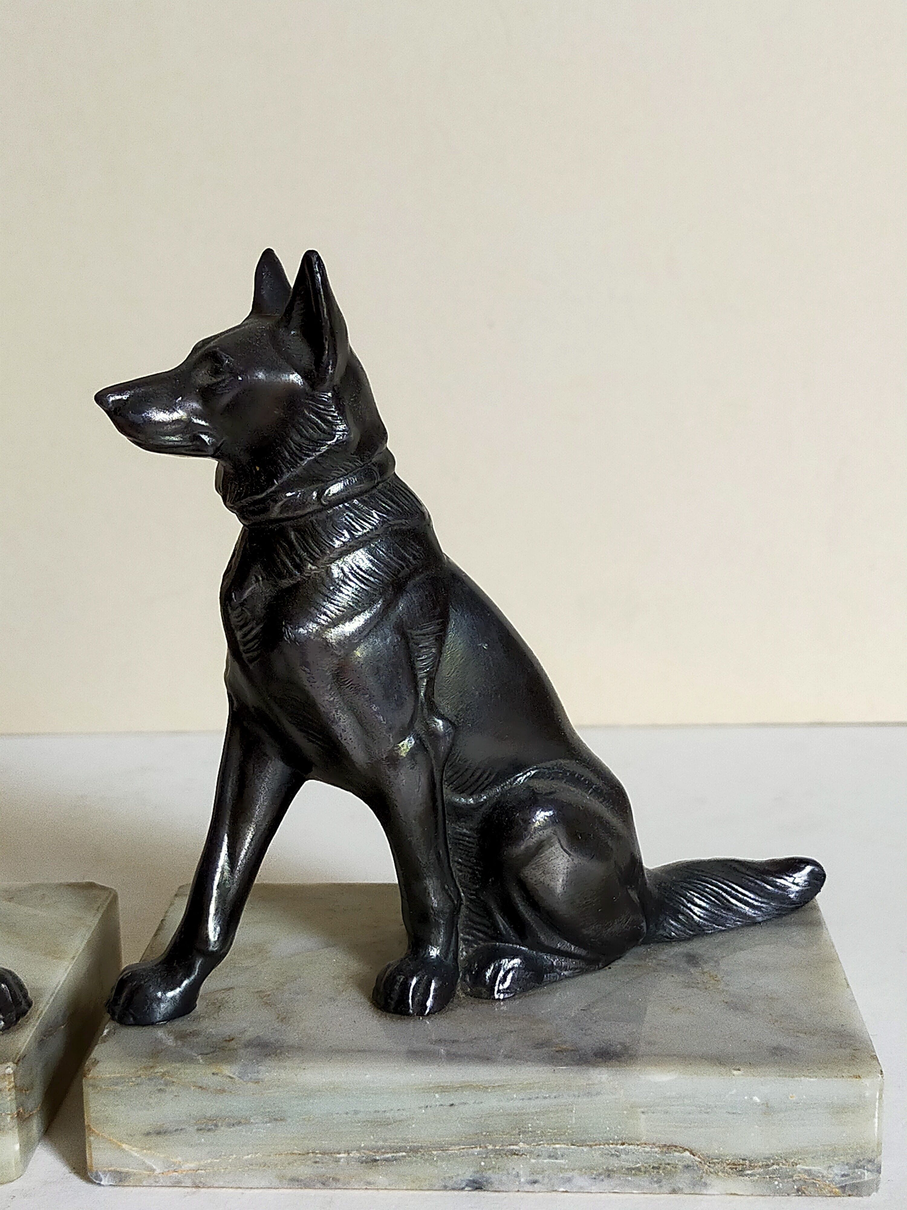 Pair of Art Deco bookends to signed wolf dogs