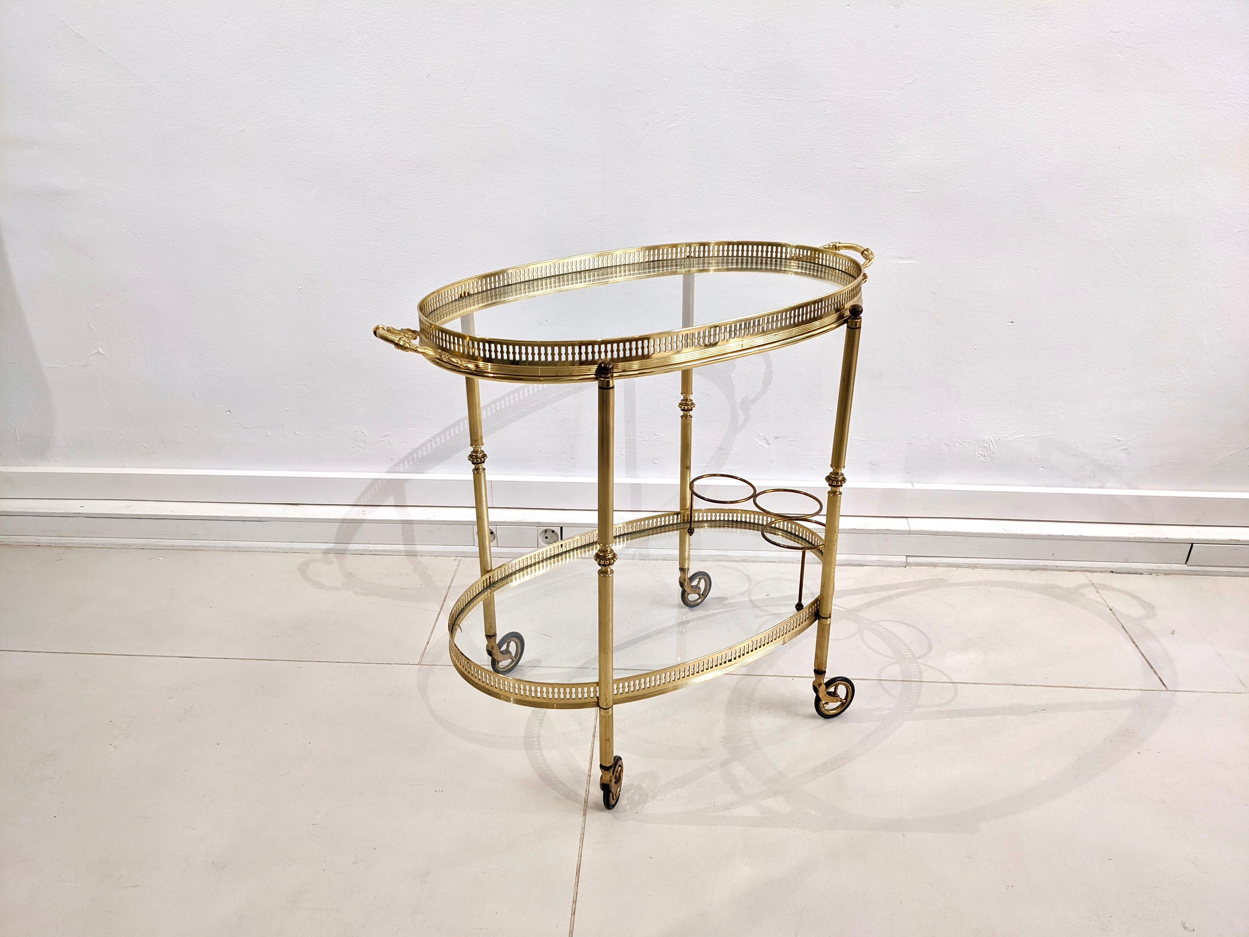 Golden metal dessert with glass tops