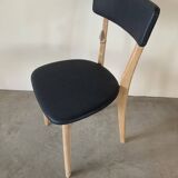 Restored vintage chair in midnight blue vinyl from the 50s
