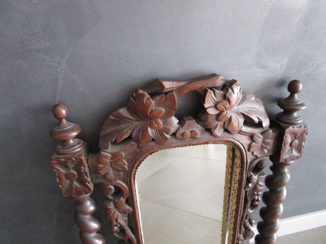 Antique carved wooden mirror