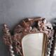 Antique carved wooden mirror