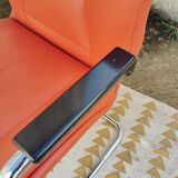 Orange leather cantilever tubular armchair