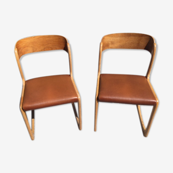 Paires de chaises type traineau d'époque fabriquée par Baumann