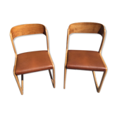 Paires de chaises type traineau d'époque fabriquée par Baumann