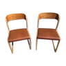 Pairs of vintage train-type chairs made by Baumann