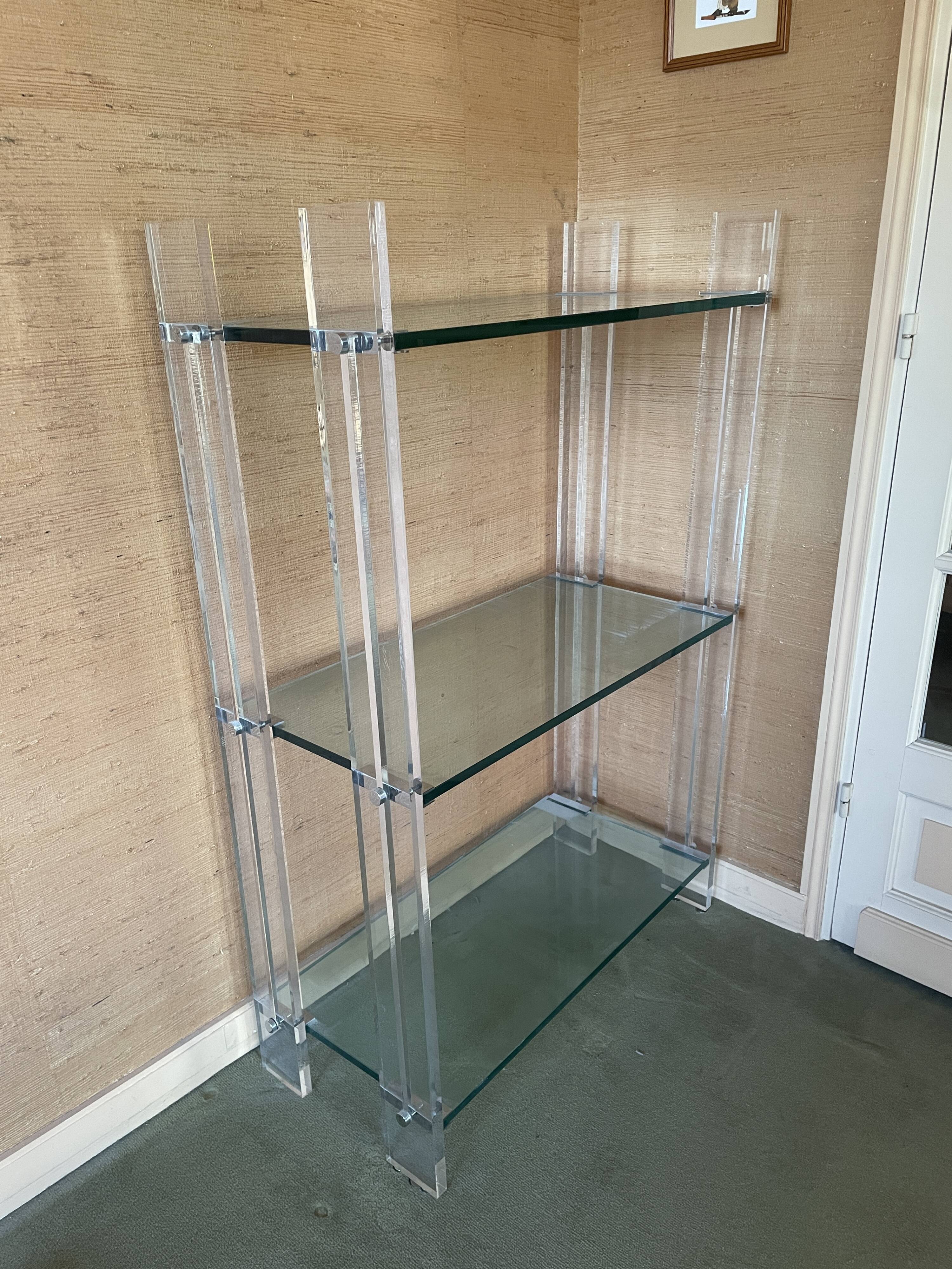 Shelf with 3 shelves in glass (shelves) and plexiglass (uprights) circa 1980.