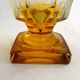 Art Deco vase engraved with flowers, faceted body on a pedestal.