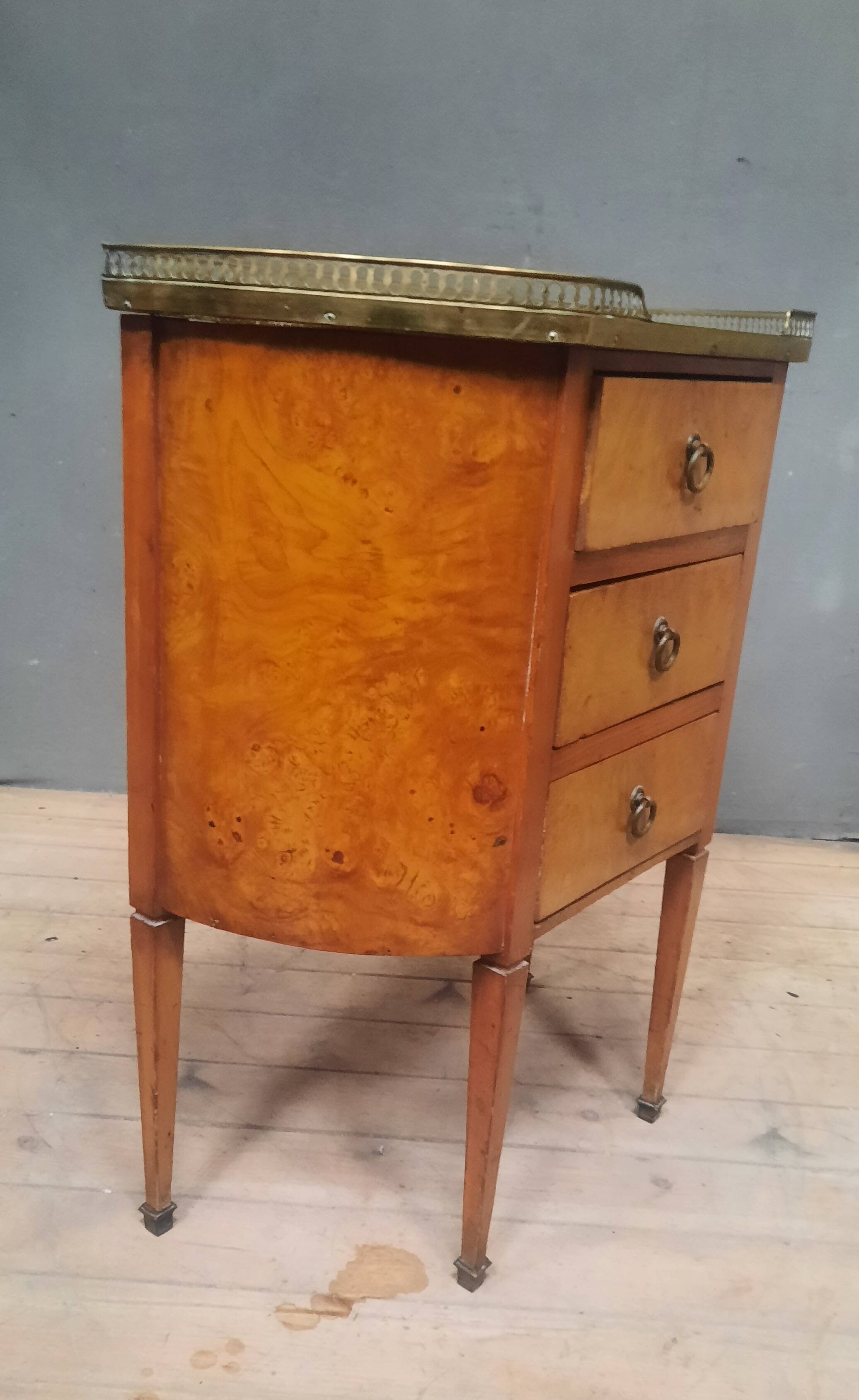 Small Louis XVI style chest of drawers with rounded sides