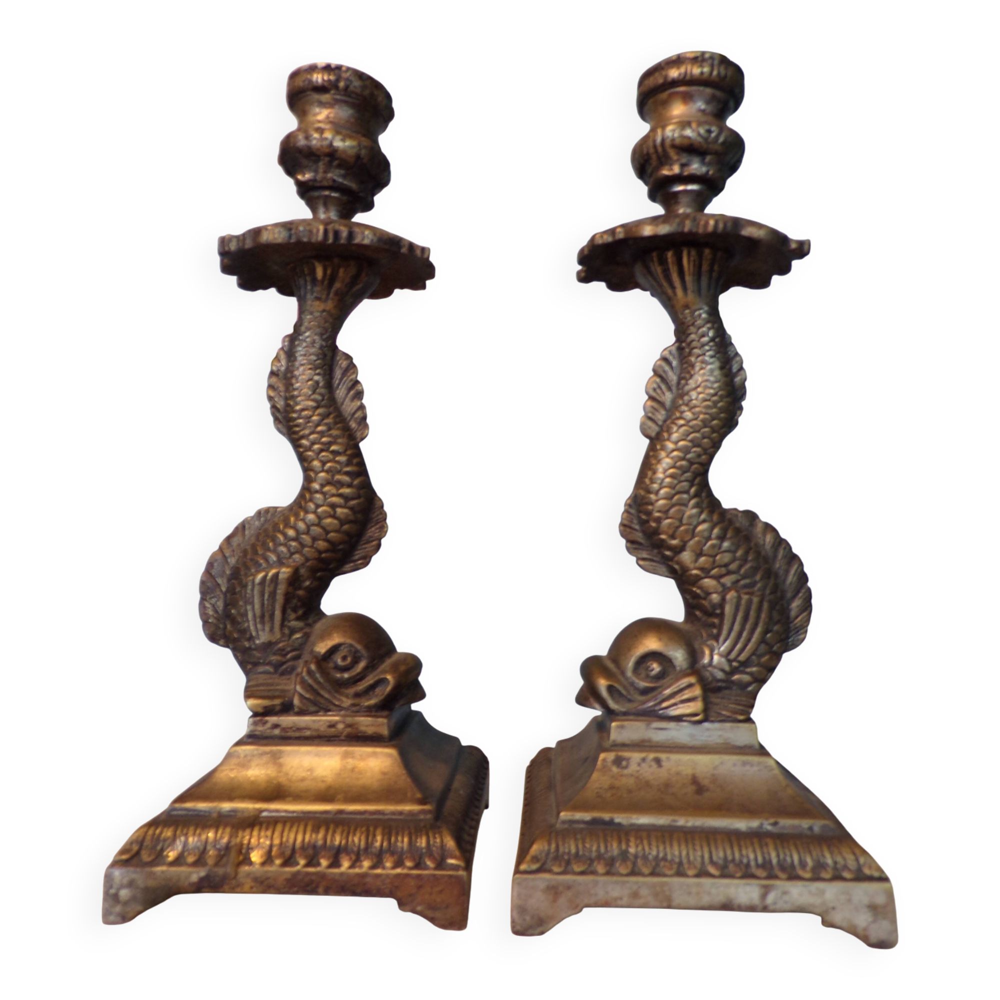 Pair of bronze dolphin candlesticks
