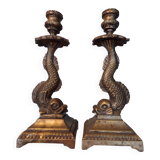 Pair of bronze dolphin candlesticks
