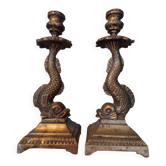 Pair of bronze dolphin candlesticks