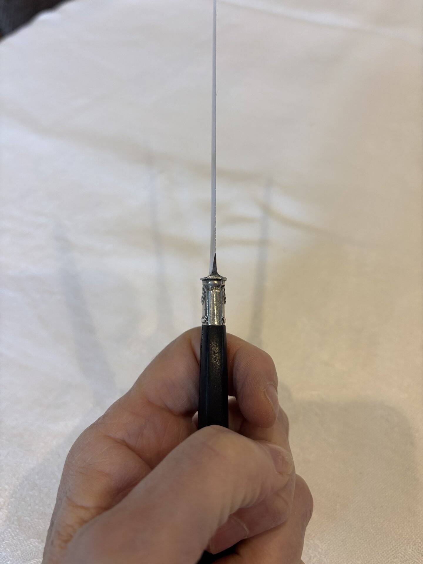 Empire-style knife set in ebony, with silver ferrules and pommels