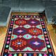 Tapis kilim brun et turquoise roumain avec des couleurs d'accent faites dans des maramures 140x190cm