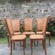 Vintage regency cherry chairs with canned backrests and seats