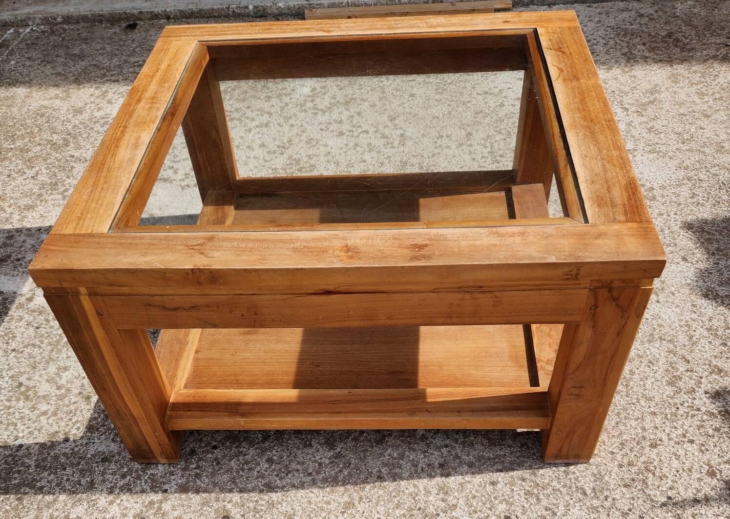 Glass coffee table in wood