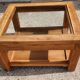 Glass coffee table in wood