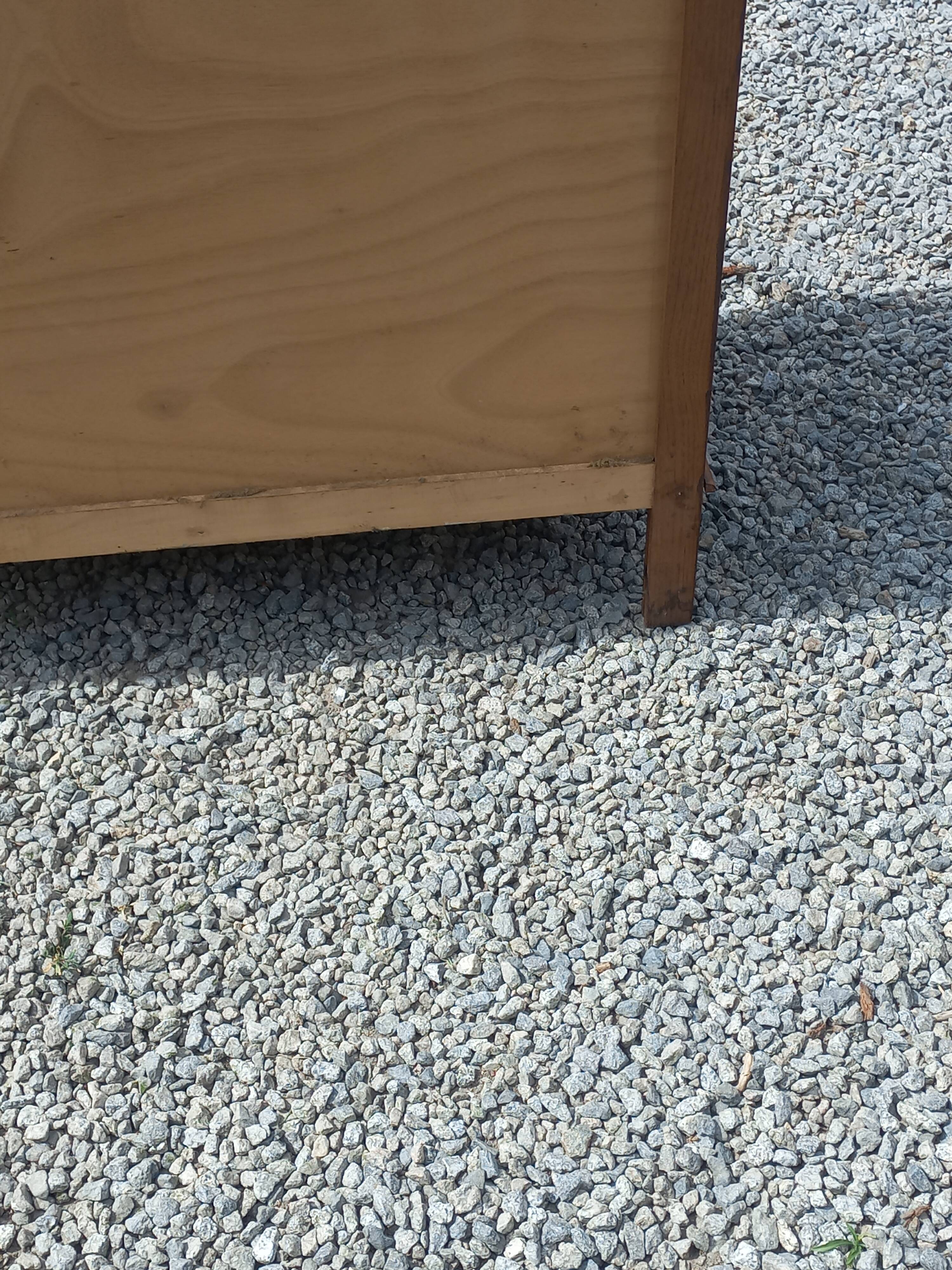 Vintage oak commode with tapered legs from the 1950s.