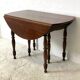 Table en acajou extensible 4 rallonges fournies