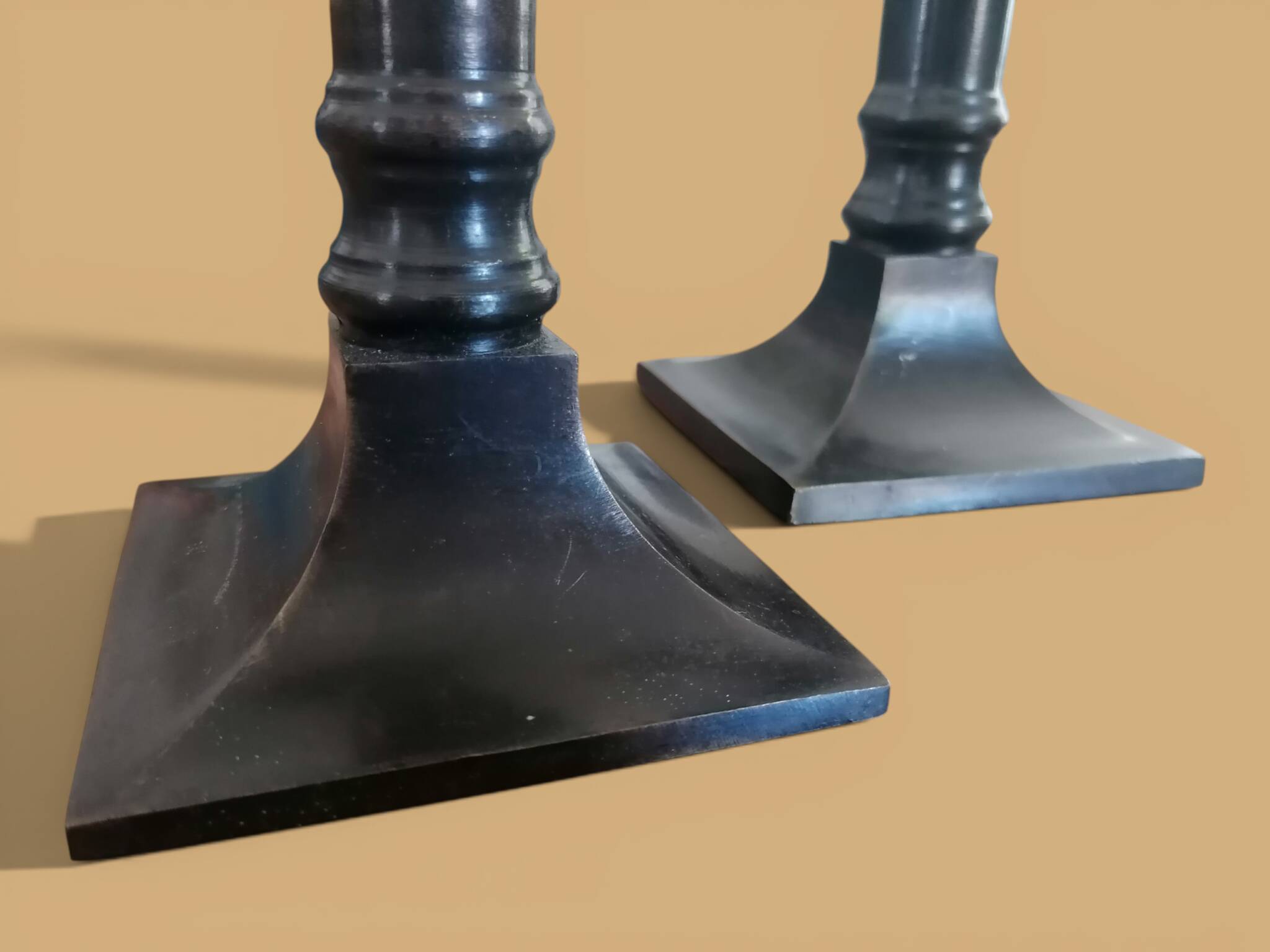 Pair of patinated bronze candlesticks Dutch Brustalistes