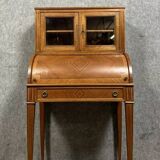 Cylinder desk topped with a Louis XVI style marquetry display case