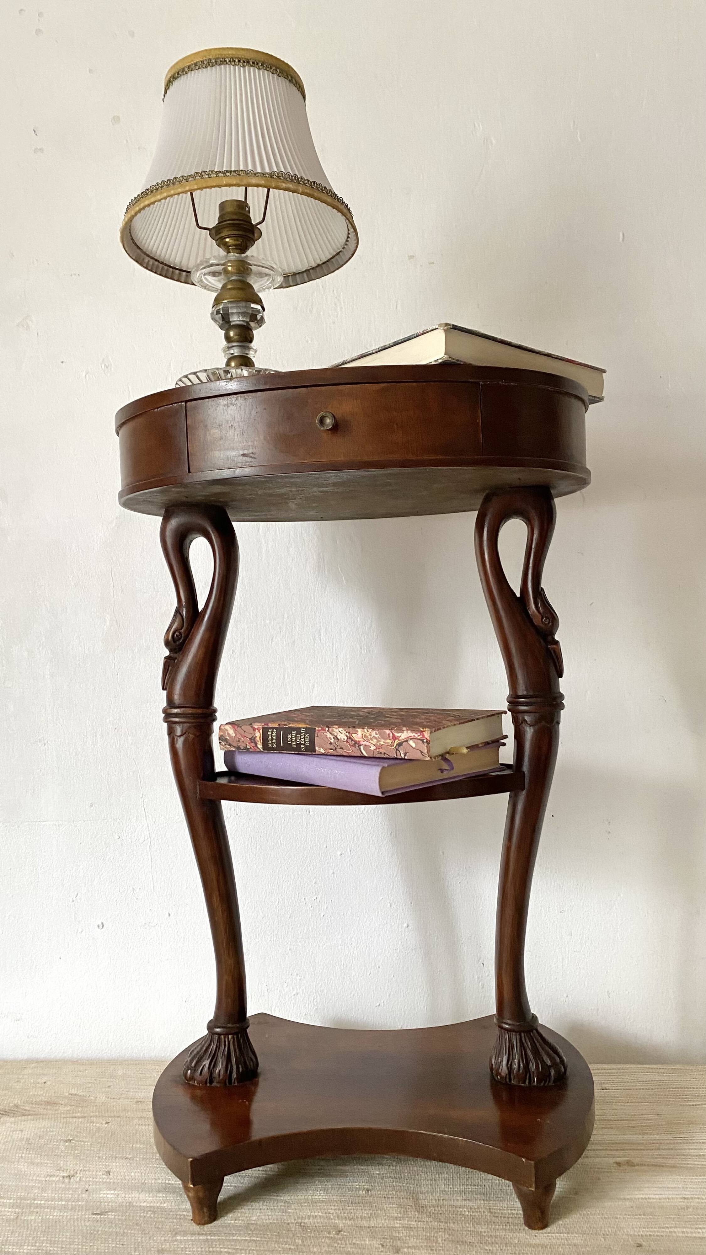 Empire style swan neck and lion paw pedestal table
