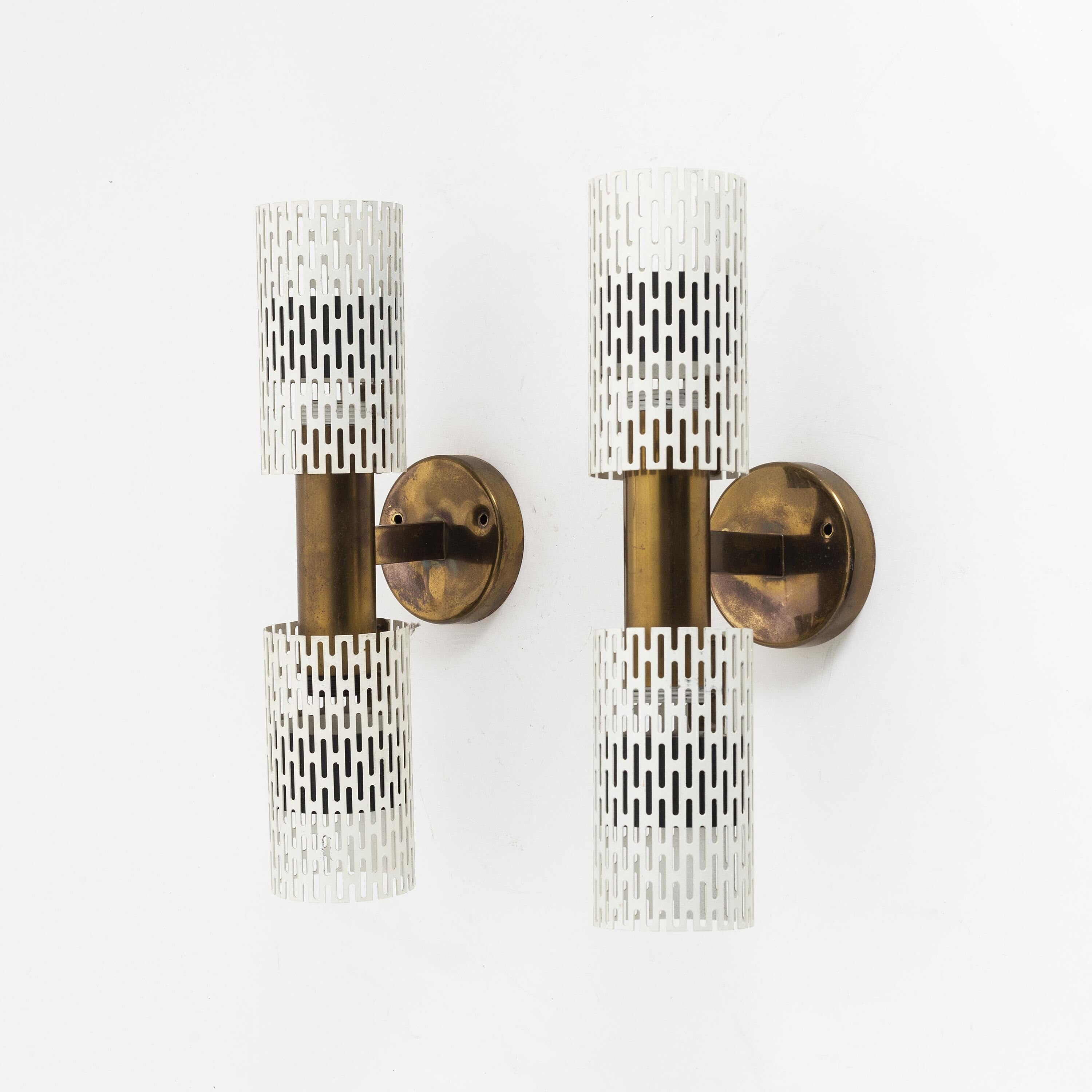 Rare pair of wall lights by Harald Notini model 11262 for Bohlmarks, 1950.