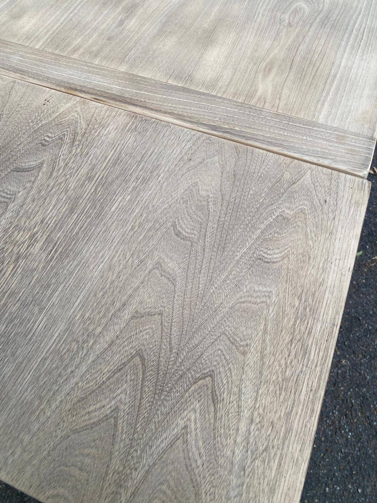 Extensible farmhouse dining table stripped in raw solid oak from the 1970s.