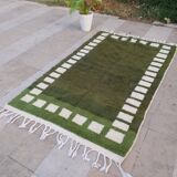Handwoven Moroccan rug, natural wool, 250cm x 150cm, elegant decoration.