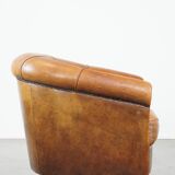Sheep leather club chair in a cognac color with patina
