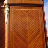 Louis XVI armoire with marquetry and gilded bronze